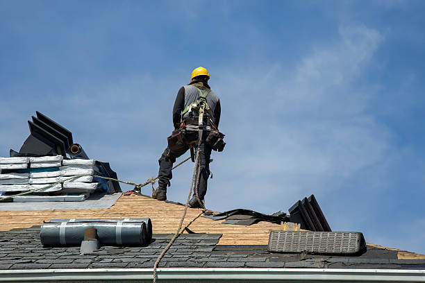 Professional Gutter Installation technician working in Belle Glade, FL